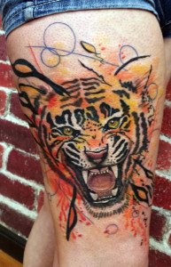 Tiger watercolor tattoo, as shown in carousel slideshow